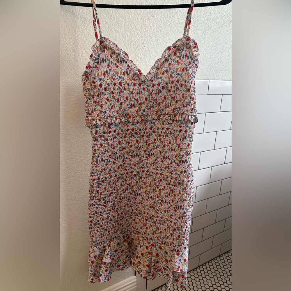 Likely size 4 shirred bodycon floral dress